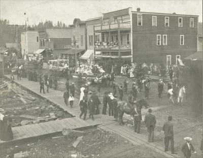 Old blank and white photo of a 4th of July parade in historic Tenino